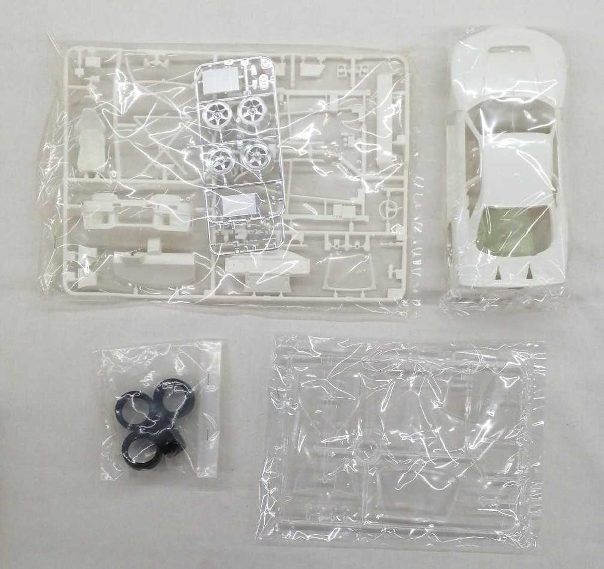 TAMIYA 1/24 Sports Car Series Unisia Gex Skyline - Banzai Thrifting | BanzaiHobby