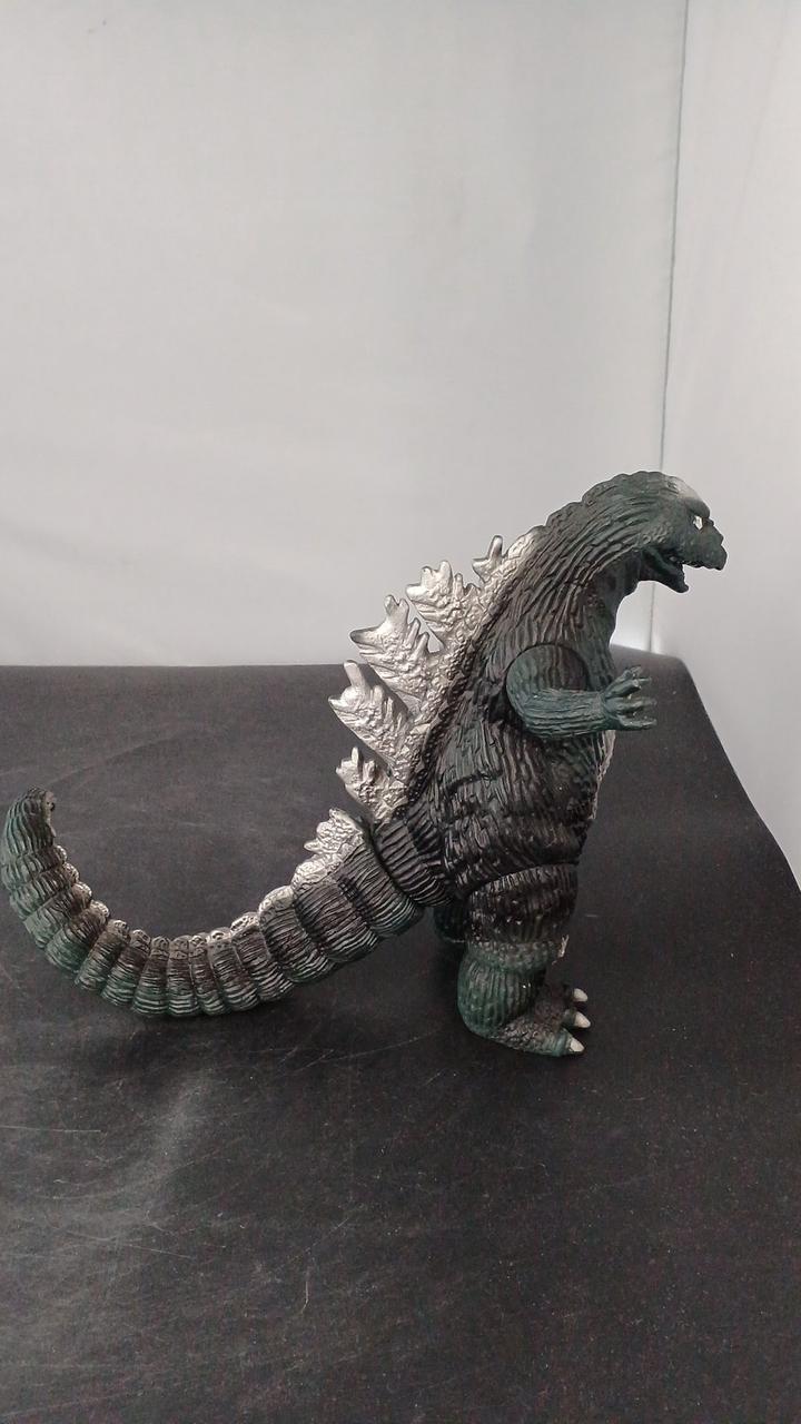 Bandai Soft Vinyl Godzilla has holes on both feet.