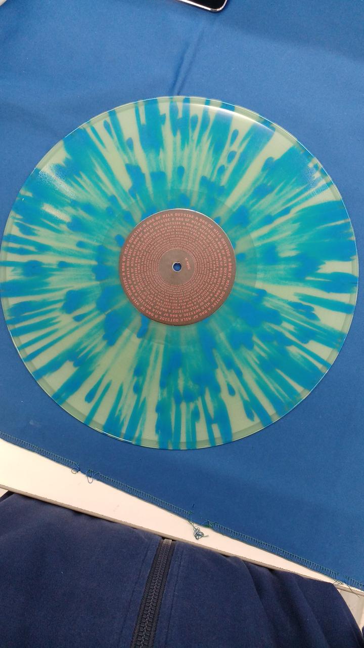 VERY OK VINYL MILK OUTSIDE A BAG OF MILK VOV006