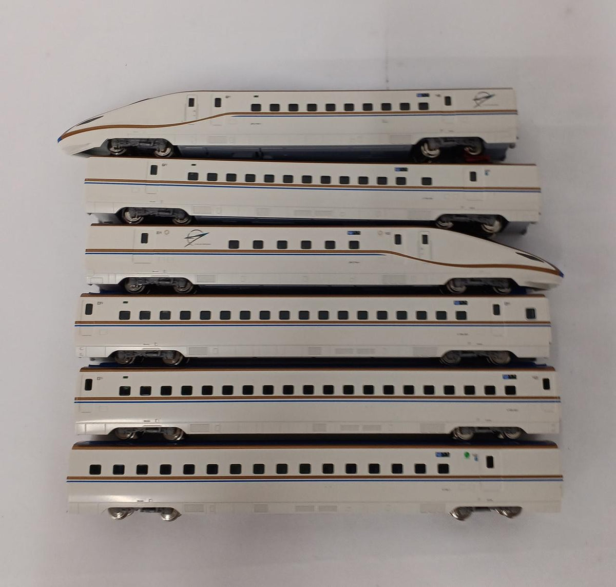 KATO N Gauge E7 Series Hokuriku Shinkansen Basic and Expansion Sets A and B 12-Car Set - Banzai Thrifting | BanzaiHobby