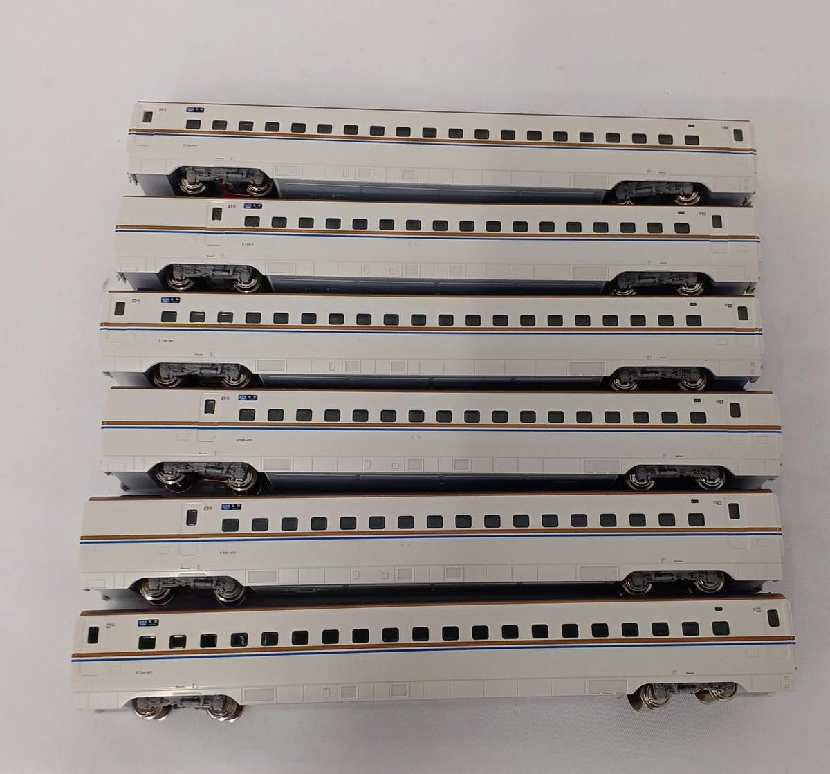 KATO N Gauge E7 Series Hokuriku Shinkansen Basic and Expansion Sets A and B 12-Car Set - Banzai Thrifting | BanzaiHobby