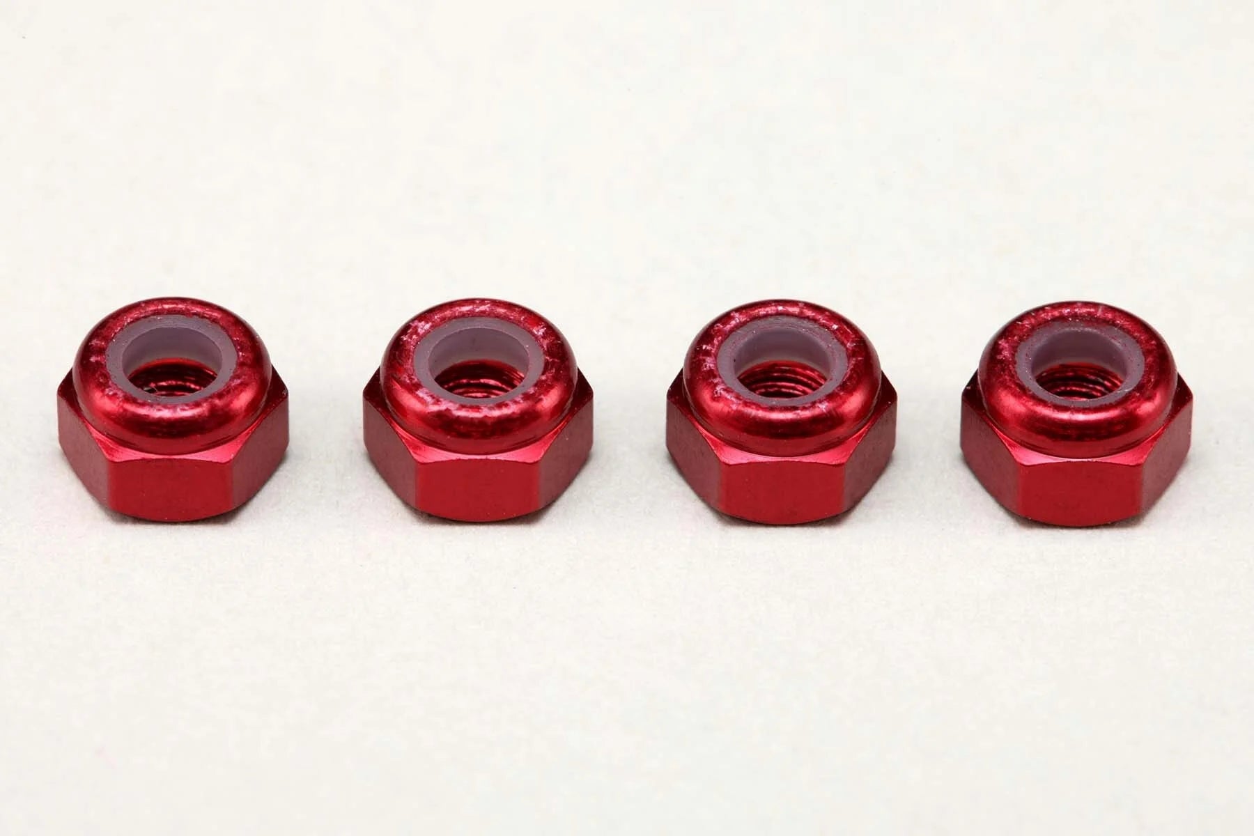 (PO MAY 2026) Yokomo ZC-N3AR Aluminum 3mm Nylon Lock Nuts / Red (4pcs) - BanzaiHobby
