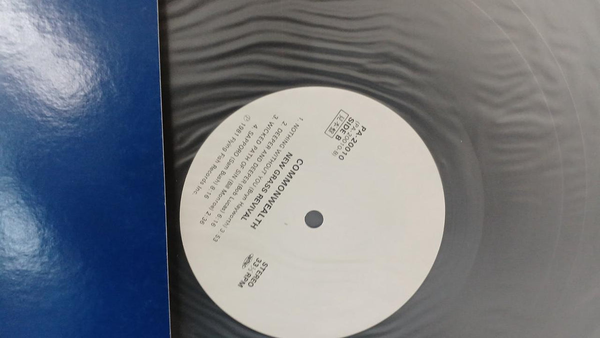 TRIO Sample Disc Unused Record Commonwealth New Grass Revival