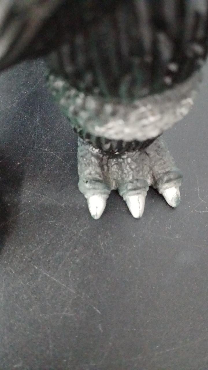 Bandai Soft Vinyl Godzilla has holes on both feet.