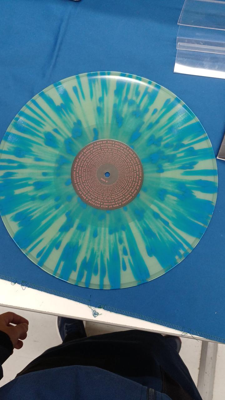 VERY OK VINYL MILK OUTSIDE A BAG OF MILK VOV006