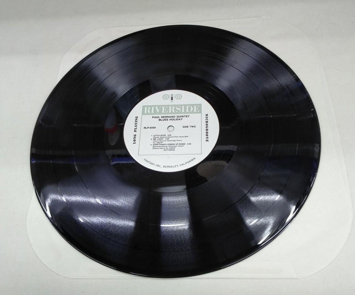 RIVERSIDE RECORDS LP BLUES HOLIDAY/PAUL SERRANO