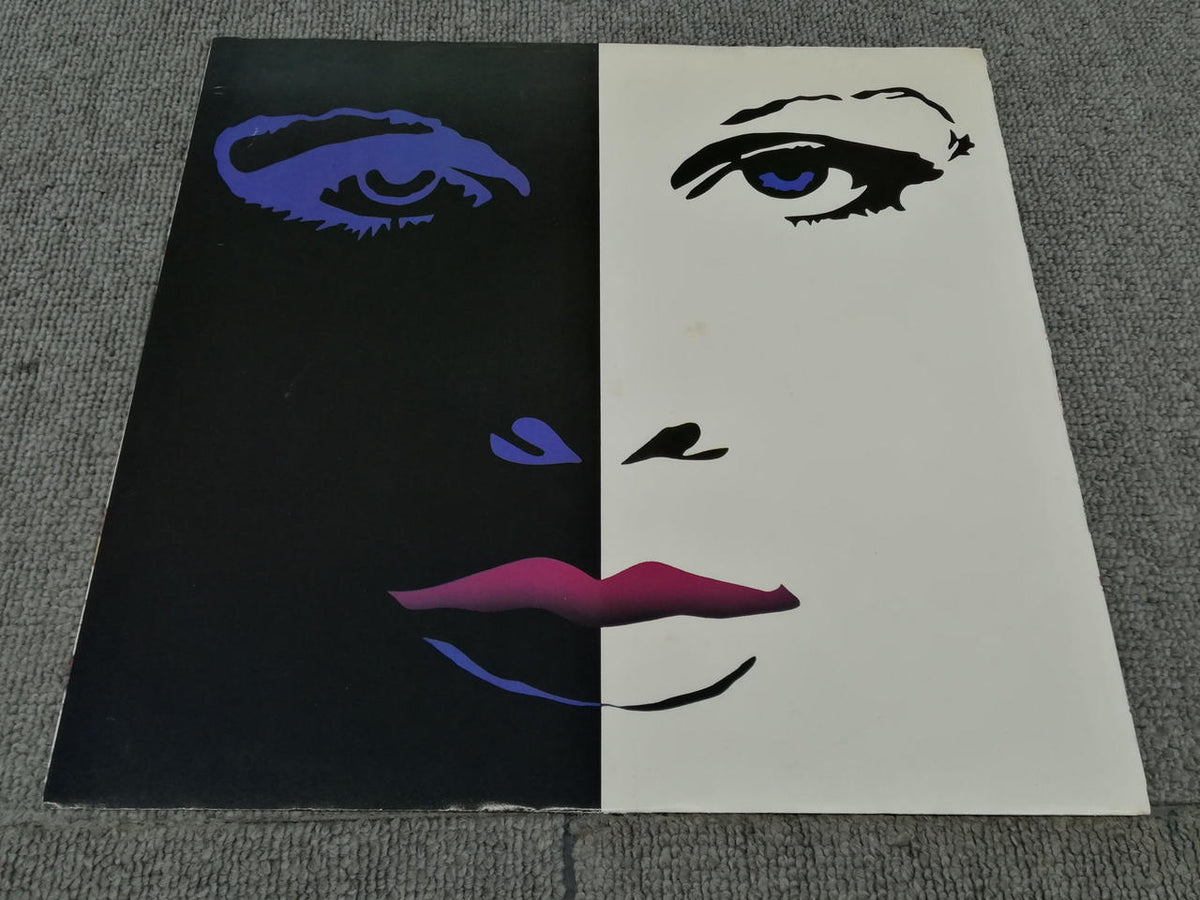 WARNER BROS. RECORDS PRINCE & THE REVOLUTION/PURPLE 25110-1