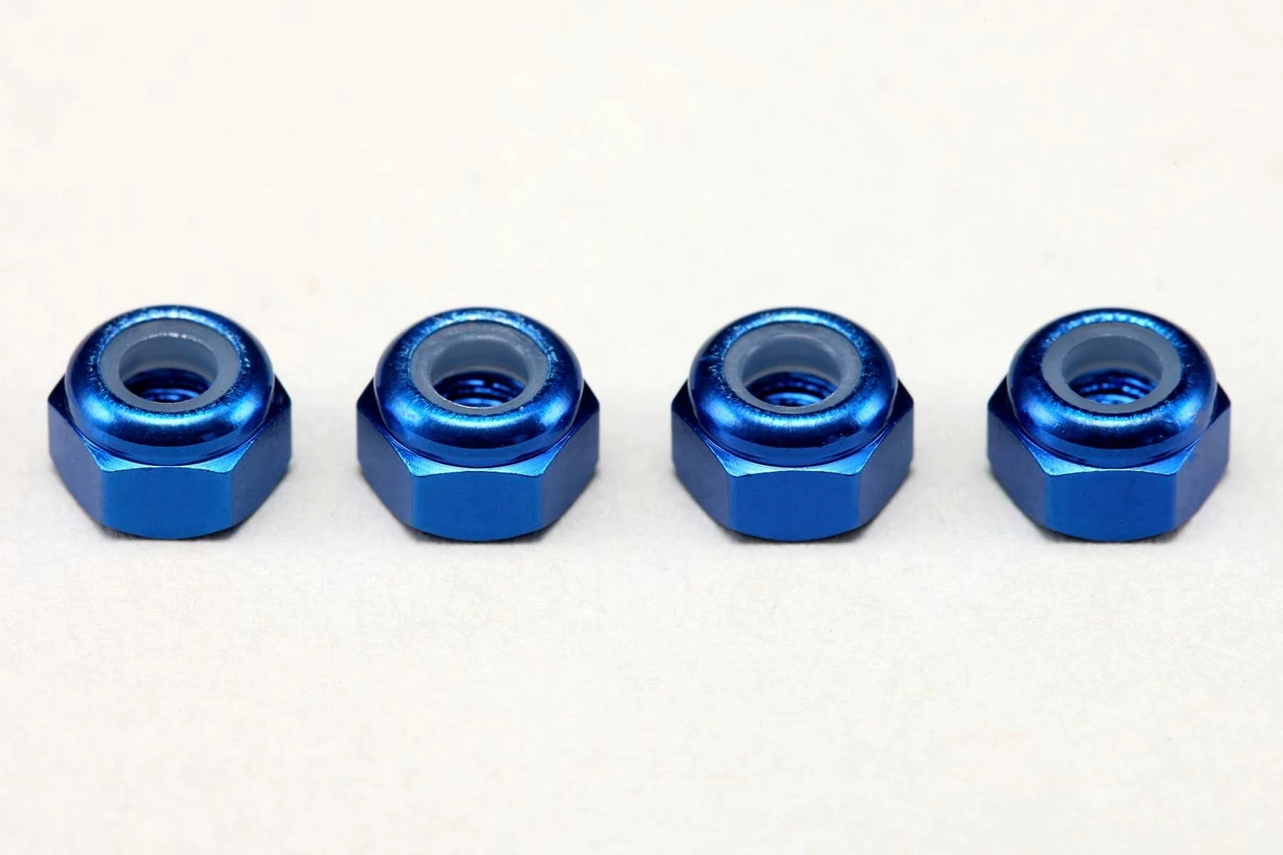 (PO MAY 2026) Yokomo ZC-N3ABL Aluminum 3mm Nylon Lock Nuts / Blue (4pcs) - BanzaiHobby