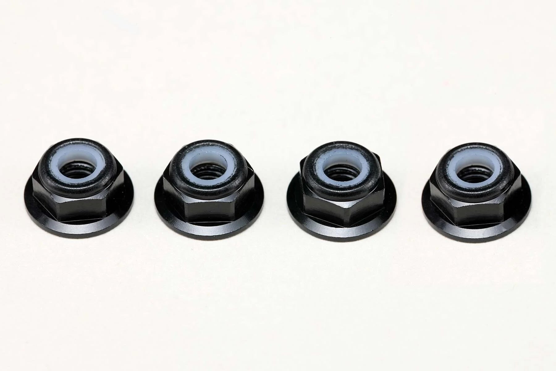 (PO MAY 2026) Yokomo ZC-N4AFLBK Aluminum 4mm Thin Flanged Nylon Lock Nuts / Black (4pcs) - BanzaiHobby