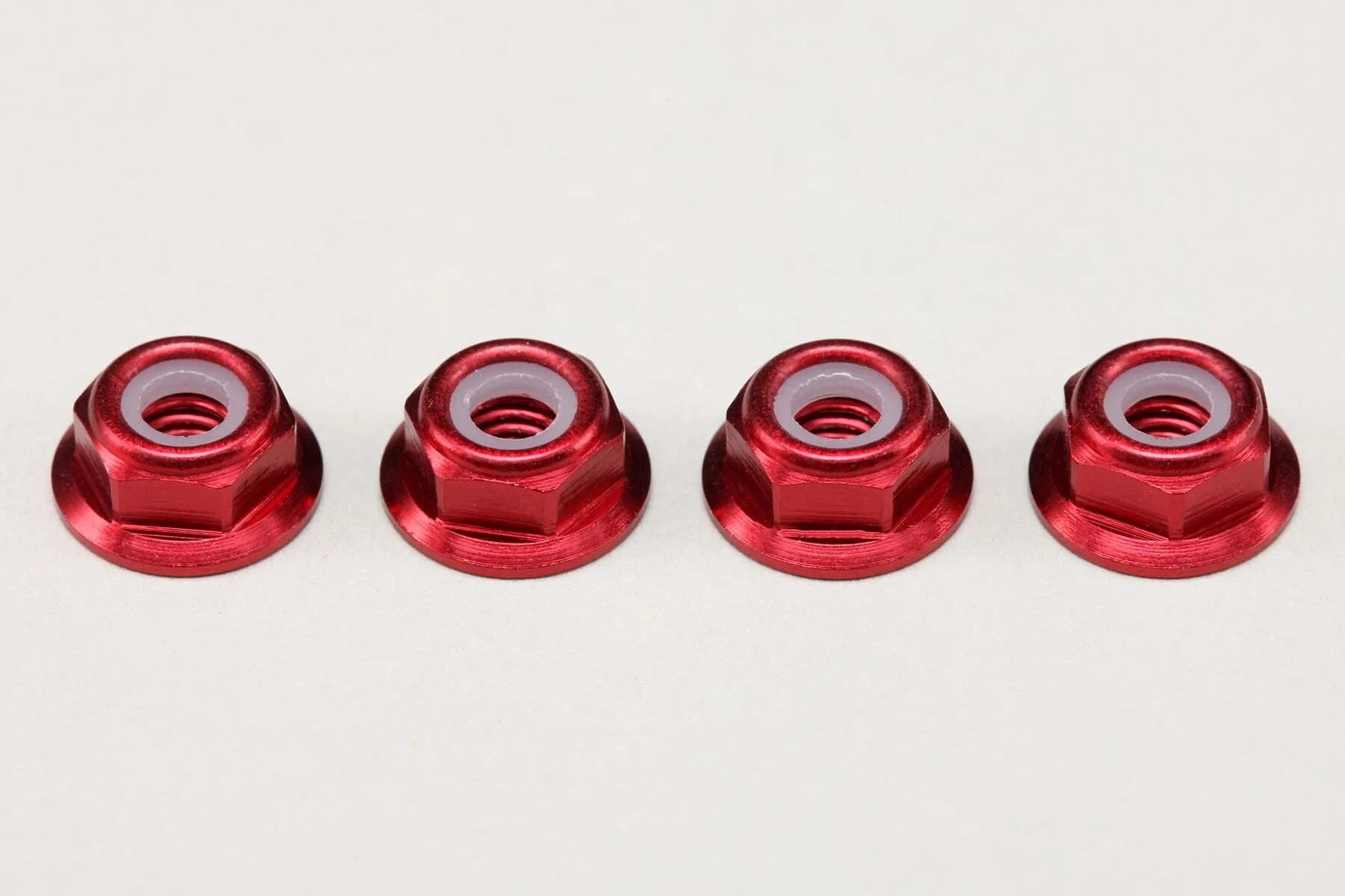 (PO MAY 2026) Yokomo ZC-N4AFLR Aluminum 4mm Thin Flanged Nylon Lock Nuts / Red (4pcs) - BanzaiHobby
