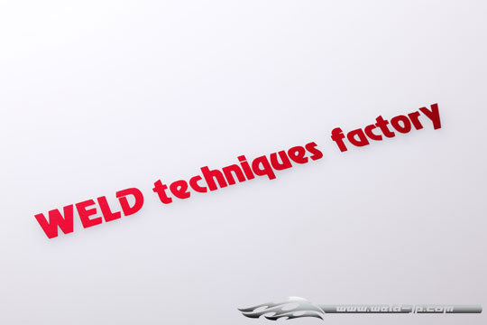 OD1893b "WELD techniques factory" logo sticker/plating red